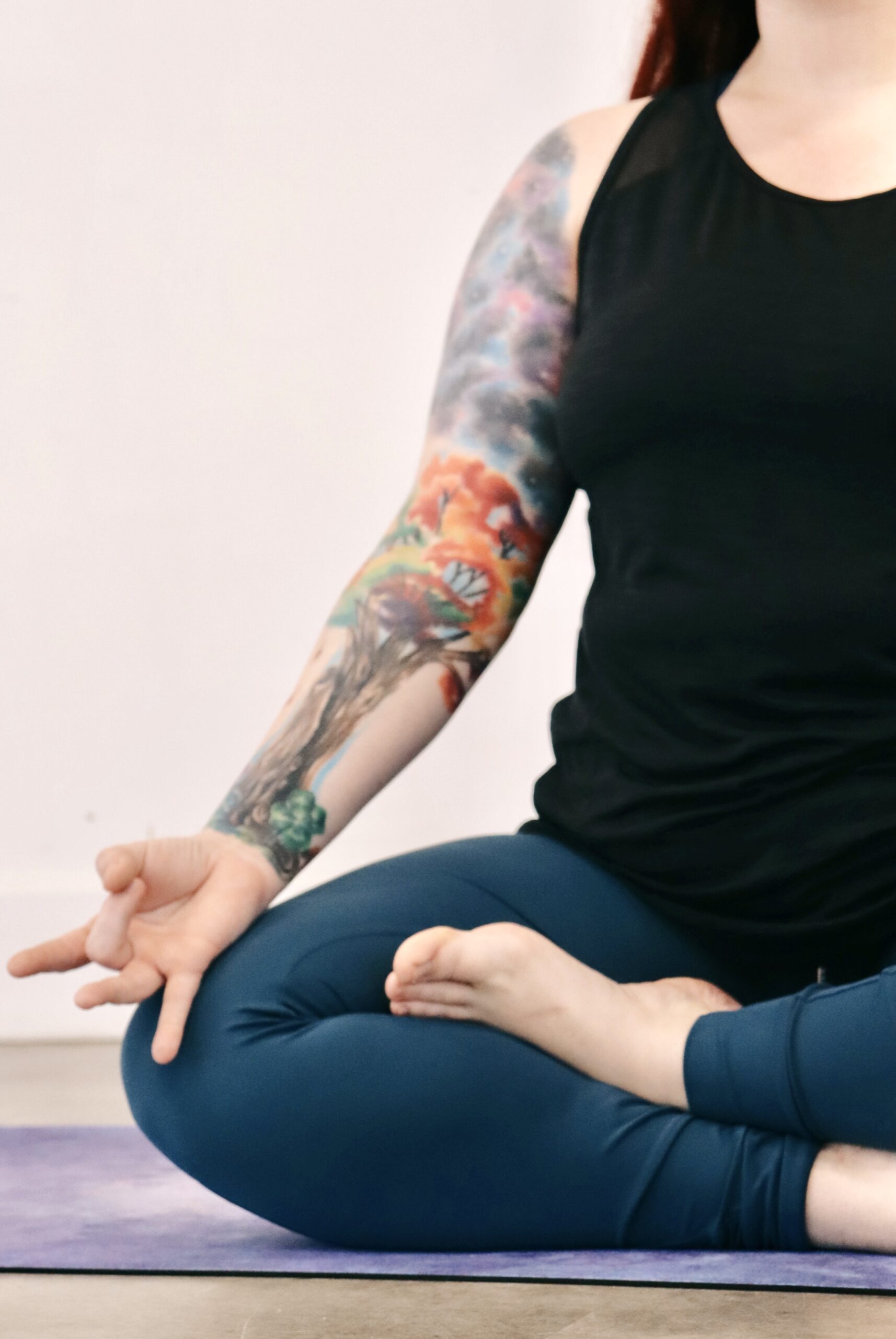 Brenda seated with mudras - About Page